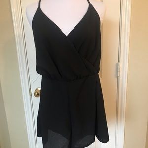 Plain black jumpsuit.